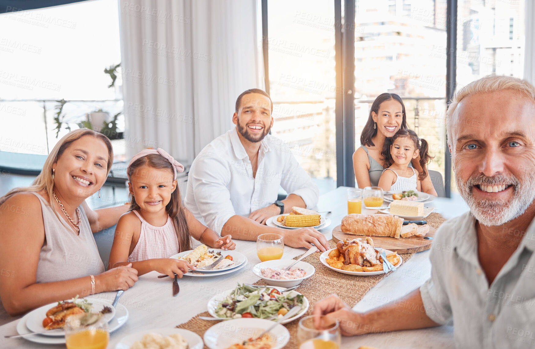 Buy stock photo Family, selfie and smile with food and together for lunch or dinner meal, generations and happiness at family home. Grandparents, parents and girl children bonding, nutrition and happy in portrait.
