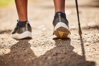 Buy stock photo Hike, foot and walking stick with a person hiking for fitness, health and wellness on a path in nature. Adventure, exercise and freedom with a healthy hiker on the mountain in the wilderness 