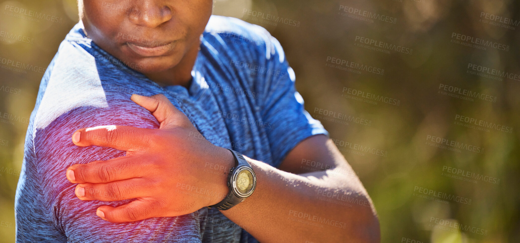 Buy stock photo Injury, fitness and black man with shoulder pain while running in nature, medical emergency and muscle accident. Anatomy, workout and athlete with a painful body symptom in a park with mockup space