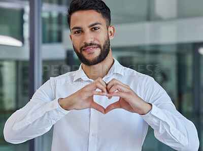 Buy stock photo Business man, heart emoji and smile of CEO, boss or leader for charity, support and thank you sign in office with happiness and pride. Portrait of entrepreneur happy about growth, trust and kindness