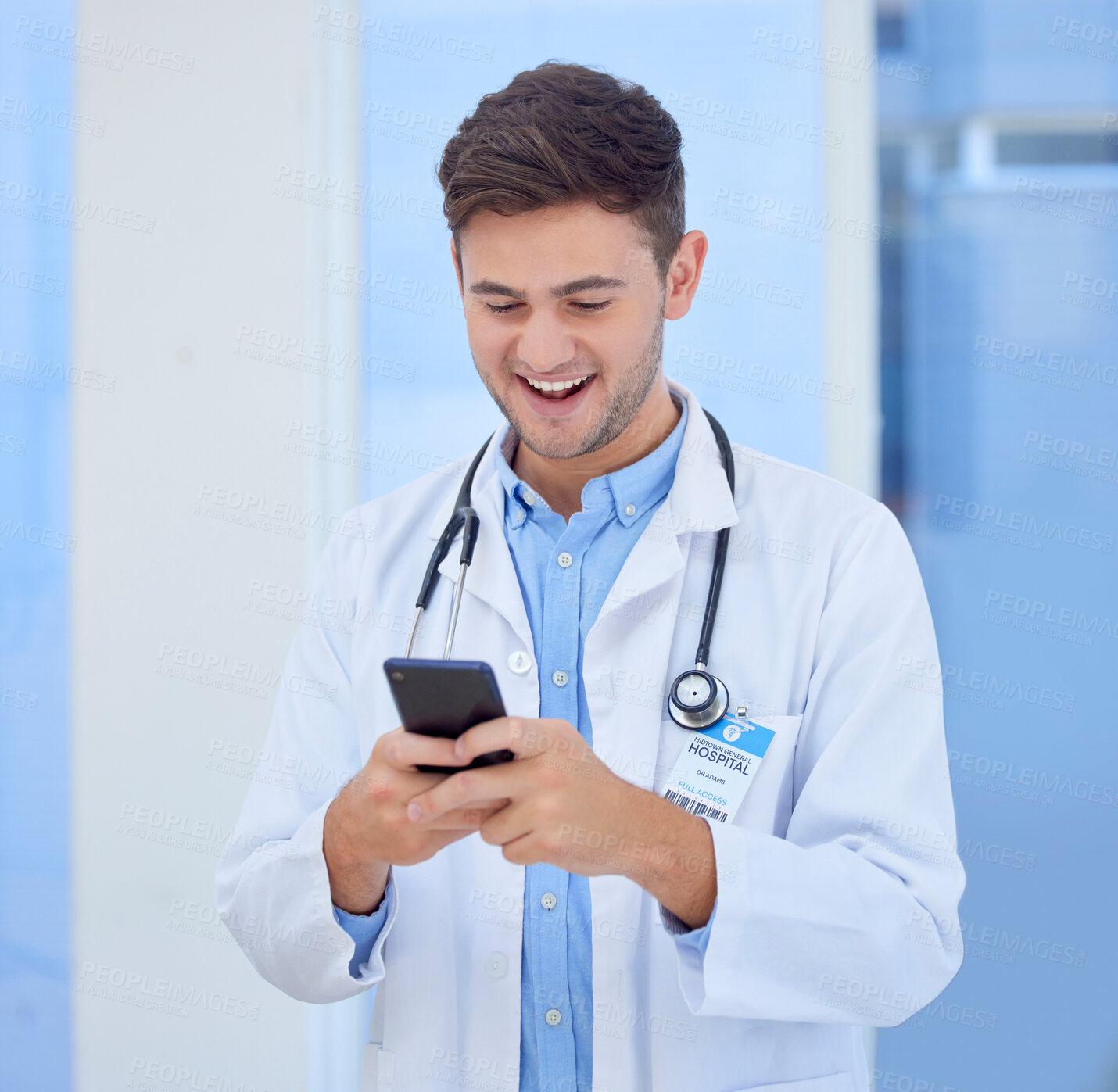 Buy stock photo Doctor, man and phone with smile for texting, communication or chatting and good connection at hospital. Happy male healthcare or medical professional smiling for telecommunication service at clinic