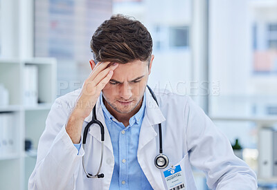 Buy stock photo Headache, stress and doctor working in his office doing medical research or analyzing test results. Burnout, exhausted and frustrated healthcare worker in a consultation room writing hospital report.