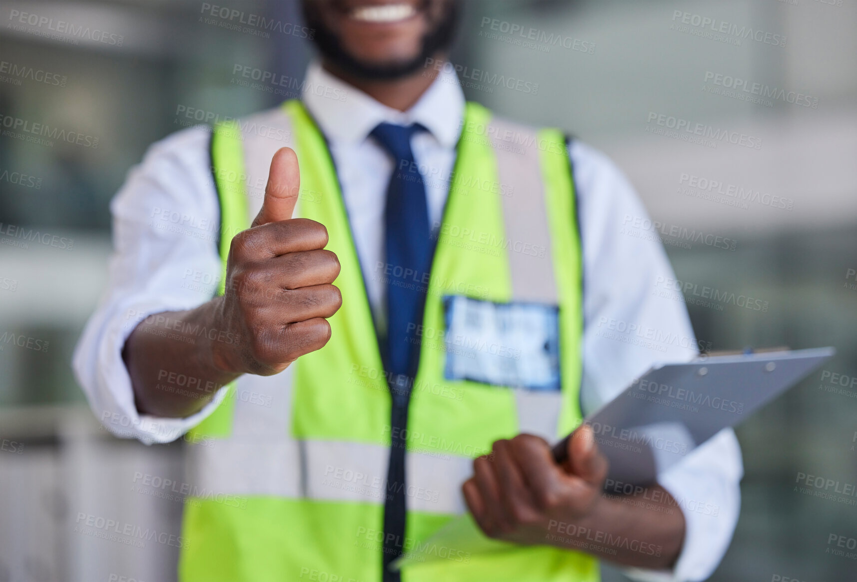 Buy stock photo Logistics, thumbs up and clipboard for engineering, construction or architecture with black man doing inspection and quality control. Hand of engineer male showing thank you, safety and success sign