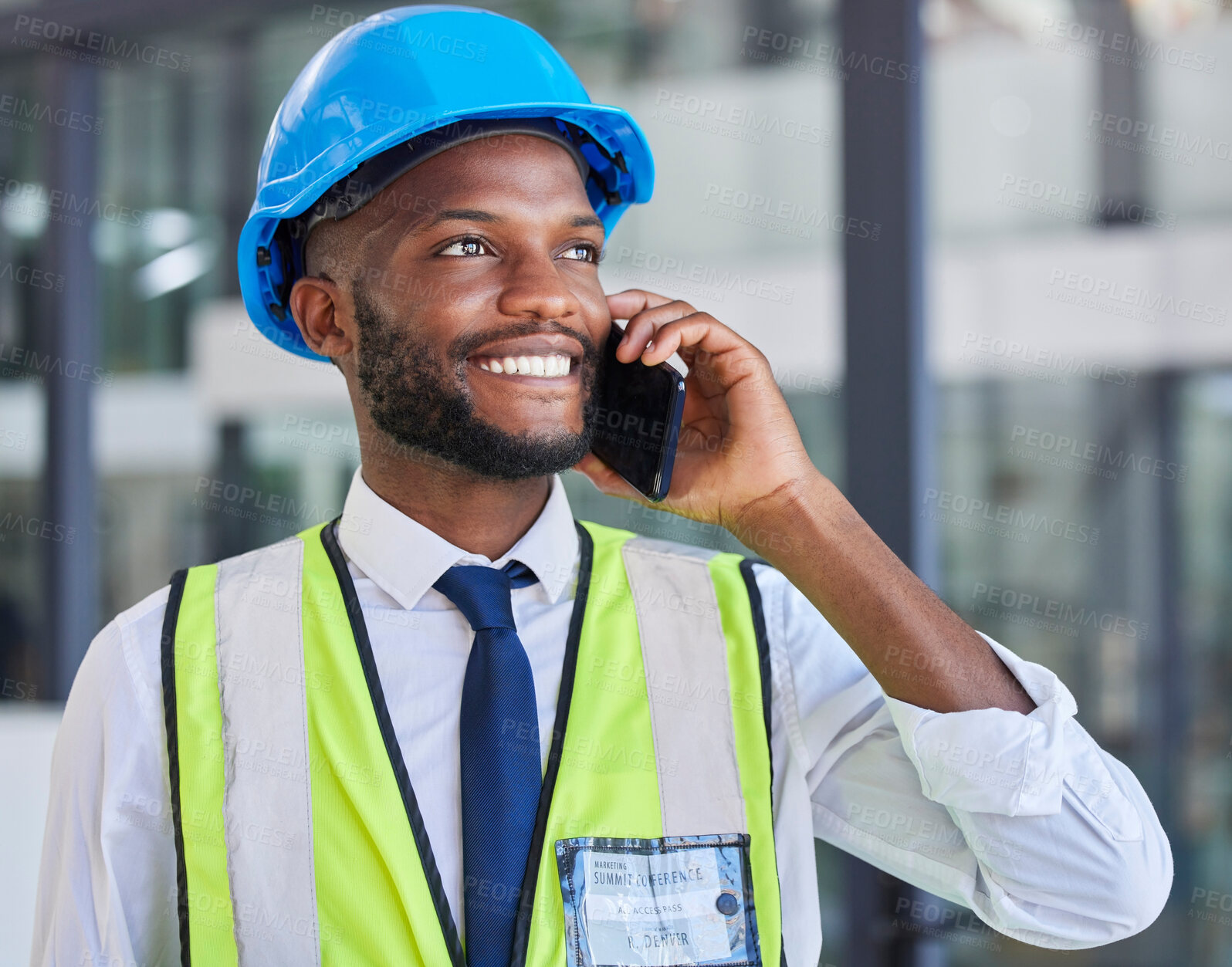 Buy stock photo Engineer, phone call and communication while networking, contact and happy smile, conversation and talking about renovation. Construction worker, black man and engineering worker speaking on tech