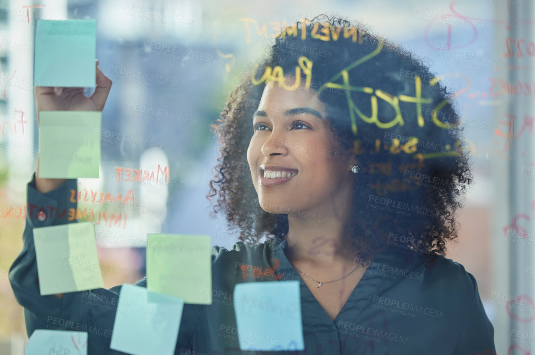 Buy stock photo Business woman, planning and writing with sticky note, glass and strategy for marketing research in advertising company. Corporate worker, happy and innovation plan, analytics and company vision