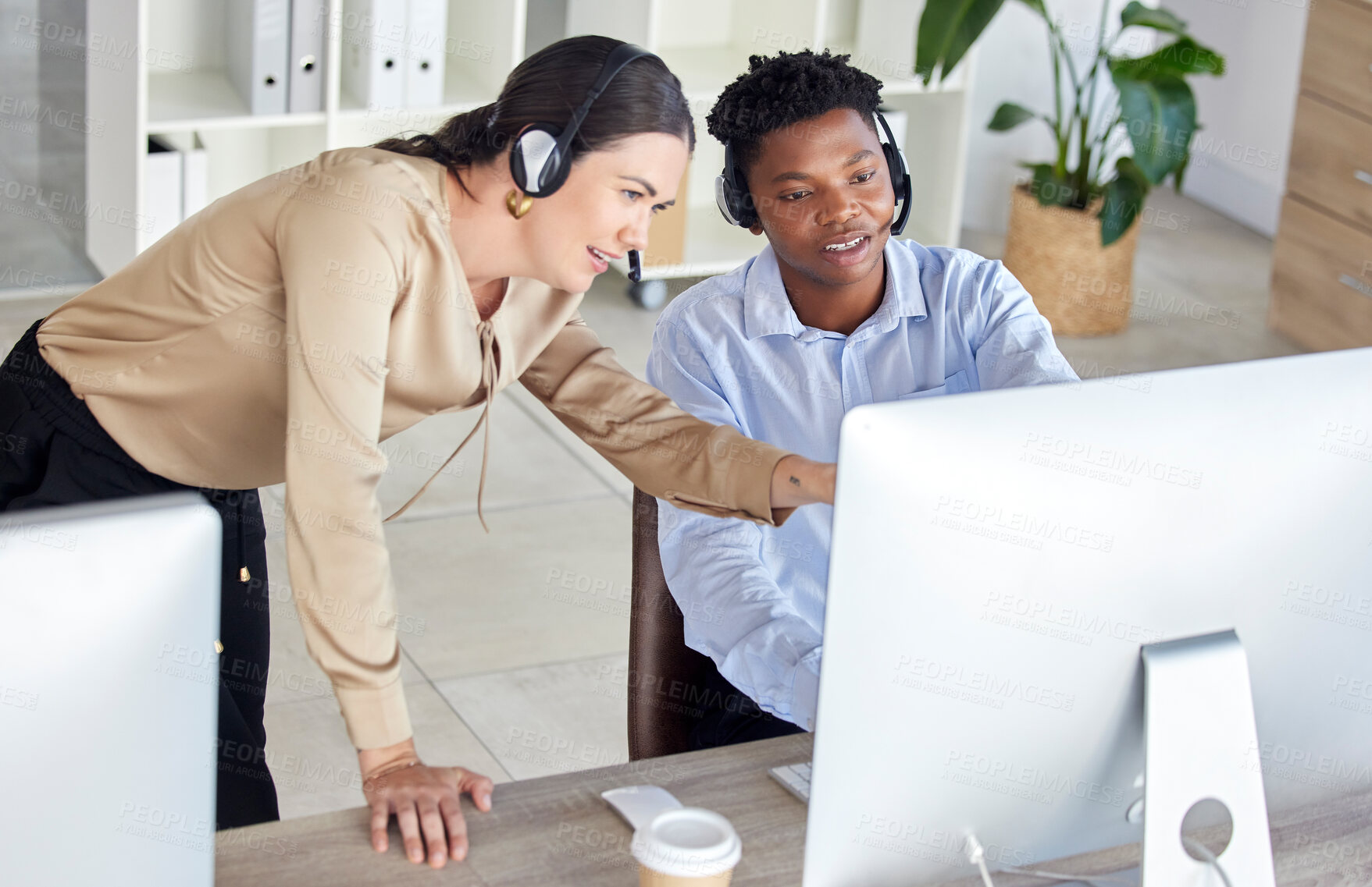 Buy stock photo Black man, woman or call center computer training in crm consulting office, b2b telemarketing sales company or contact us startup. Talking receptionist, worker and employee in intern technology help