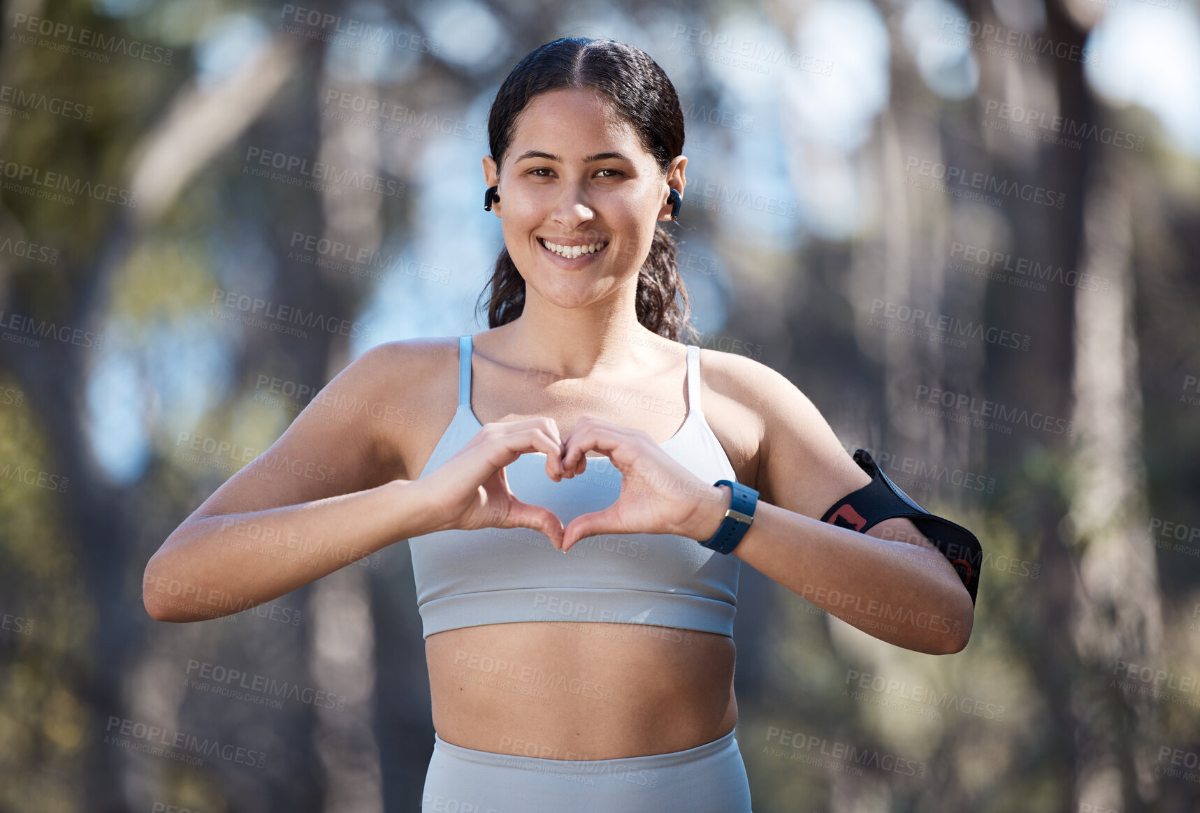 Buy stock photo Fitness, heart hands sign or portrait of woman outdoor running in nature, forest or park woods for body health. Emoji self love symbol, freedom peace or athlete runner training for self care wellness