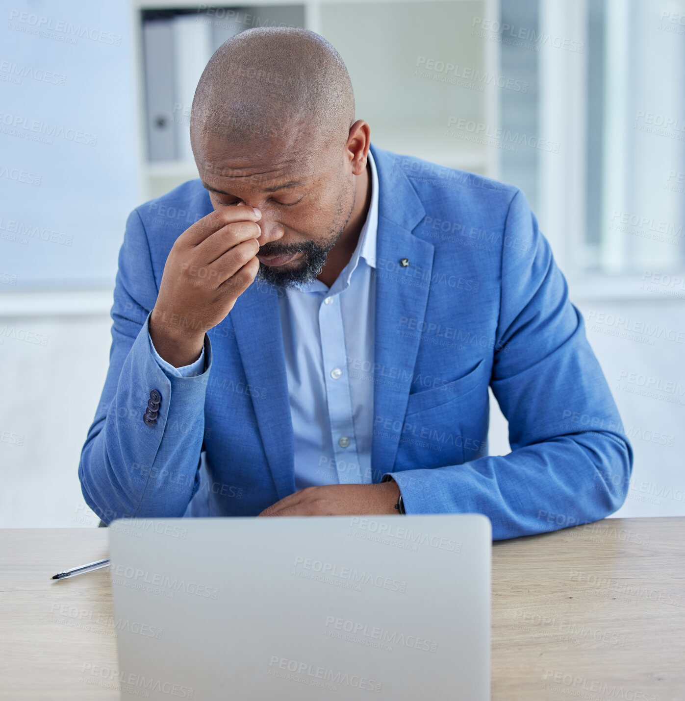 Buy stock photo Businessman, laptop and headache in burnout, stress or depression from overworking at the office. Black man employee suffering in mental health problems or strained eyes from long hours on computer