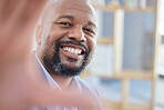 Black man, happy and selfie with a businessman taking a picture while standing alone in the office at work. Portrait, happy and smile with a male employee for a social media photograph while working