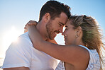 Couple, forehead and hug for love, care or support in relationship romance and bonding together in the outdoors. Happy man and woman hugging in loving embrace or compassion for summer vacation travel