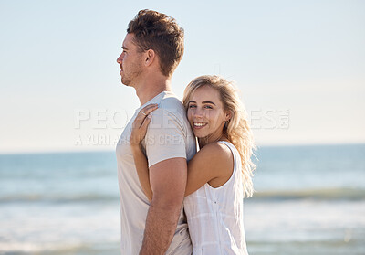Buy stock photo Love, happy and couple hug at a beach in Florida on summer holidays with affection, freedom and peace. Smile, relax and romantic woman enjoys hugging her calm young partner at sea on vacation romance