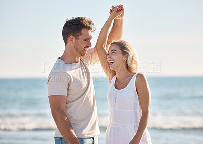 Buy stock photo Beach, love and dance with a young couple in nature, happy together during a date or summer vacation. Smile, travel and romance with a man and woman dancing by the sea or ocean while bonding