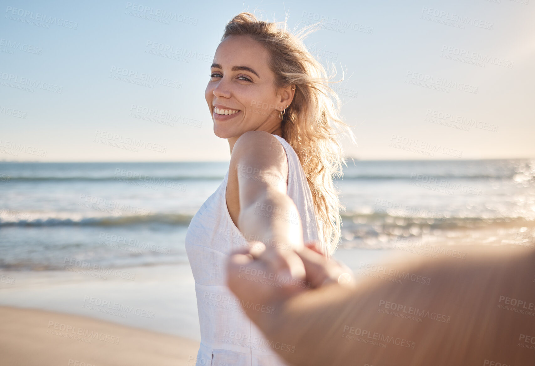 Buy stock photo Love portrait, woman pov and holding hands on beach and happy relationship, anniversary and embrace while on holiday together. Romance, man and woman smile, loving and bonding with sunset on vacation