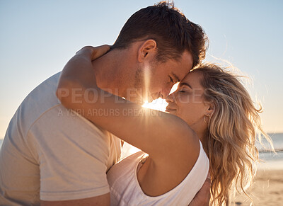 Buy stock photo Love, beach hug and couple face together on sunset vacation date by the sea for romance, affection and relationship commitment. Happy man, woman with a smile and romantic ocean summer holiday getaway