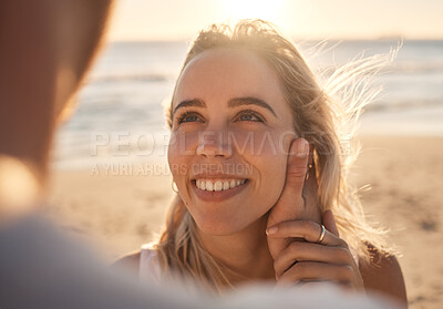 Buy stock photo Affection, love and couple at the beach for a date, honeymoon and quality time by the sea. Travel, relax and face of a woman with an embrace from a man while on holiday by the ocean to relax