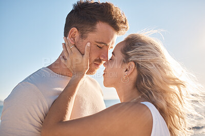 Buy stock photo Love, couple and eyes closed on beach holiday, vacation or summer date outdoors. Romance, affection and man and woman ready for kiss, having fun on honeymoon and enjoying time together at seashore.

