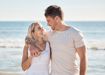 Buy stock photo Happy, love and smile with couple at beach for relax, travel and summer by the sea. Freedom, support and hug with man and woman on date vacation together for bonding, affection and ocean holiday