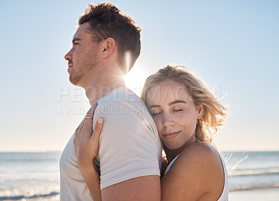 Buy stock photo Love, couple and hug on beach holiday, vacation or summer date outdoors. Affection, romance and smile of man and woman on honeymoon, embrace and enjoying quality time together at seashore or coast.