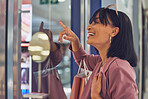 Happy woman, window and shopping, mall and excited to buy sales, discount products and luxury fashion clothes. Smile customer pointing in glass, shopping mall and choice, decision and retail boutique