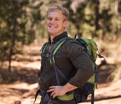 Buy stock photo Hiking forest, fitness and portrait of man trekking in woods for freedom, peace or adventure journey for body wellness. Exercise travel, training workout and backpacking hiker walking on nature path