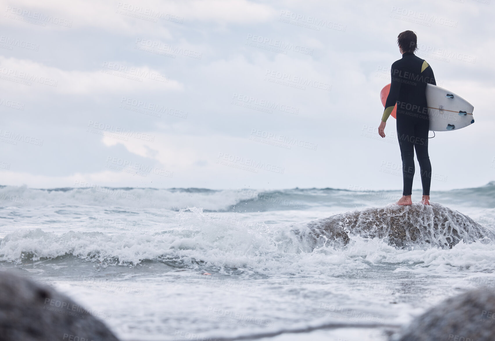 Buy stock photo Sports, ocean surfing and man ready for fitness challenge, nature practice training or waves travel in sea water mock up. Sky storm clouds, adventure and mockup back view of surfer with freedom peace