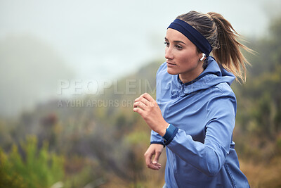 Buy stock photo Fitness, woman and running in nature for exercise, training or cardio workout in healthy wellness. Active female runner exercising in sports run for health, endurance and wellbeing in the outdoors