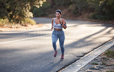 Buy stock photo Wellness, nature or woman running on mountain street for marathon training, cardio fitness or workout. Motivation, sports or girl runner from Canada for road exercise, health or triathlon outdoor
