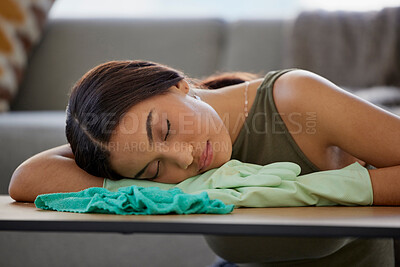 Buy stock photo Cleaner, relax and sleep on table in home after cleaning with cloth and rubber gloves. Spring cleaning, burnout and tired woman house worker sleeping, nap or resting after complete household tasks.