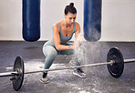 Woman, bodybuilder and powder in gym for barbell on hands for, safety, wellness and fitness. Girl, deadlift and weightlifting for workout, crossfit and strong body with power, muscle and healthy