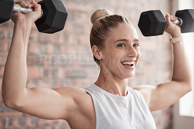 Fitness, dumbbell weights and woman training for a weightlifting exercise in the gym or studio. Sports, health and strong girl doing a arm workout for strength, health and wellness at a sport center.
