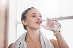 Water bottle, woman athlete and tired from indoor fitness workout, training exercise and thirsty or dehydrated after cardio. Body health wellness, h2o drink and sports woman for sport advert mockup 
