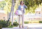 Woman, phone call and fashion shopping bags on city road for London street networking, taxi order or transport lift. Smile, happy or retail customer gifts, mall or style clothes product on 5g mobile