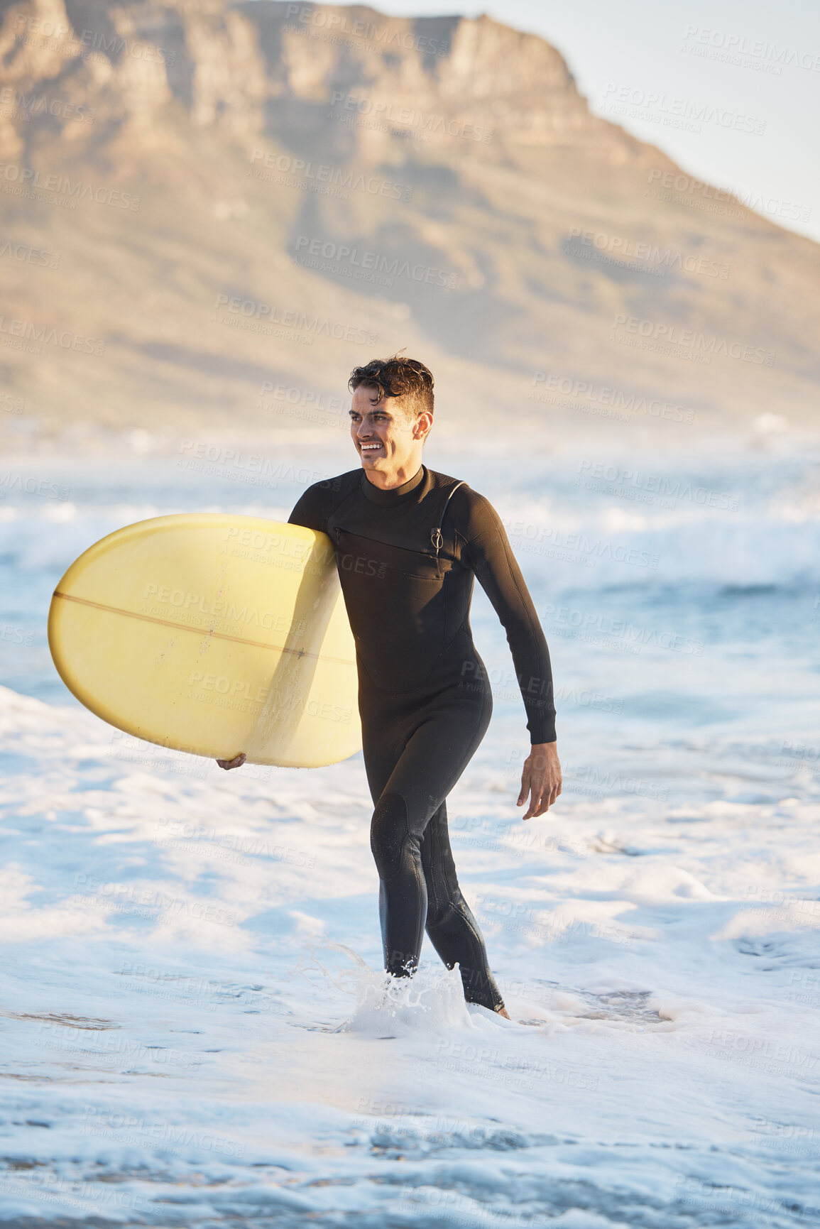 Buy stock photo Surfing sports and man walking from ocean with smile, surfboard in hand and happiness in summer. Nature, water sports and male surfer on beach shore after fitness, exercise and cardio for wellness