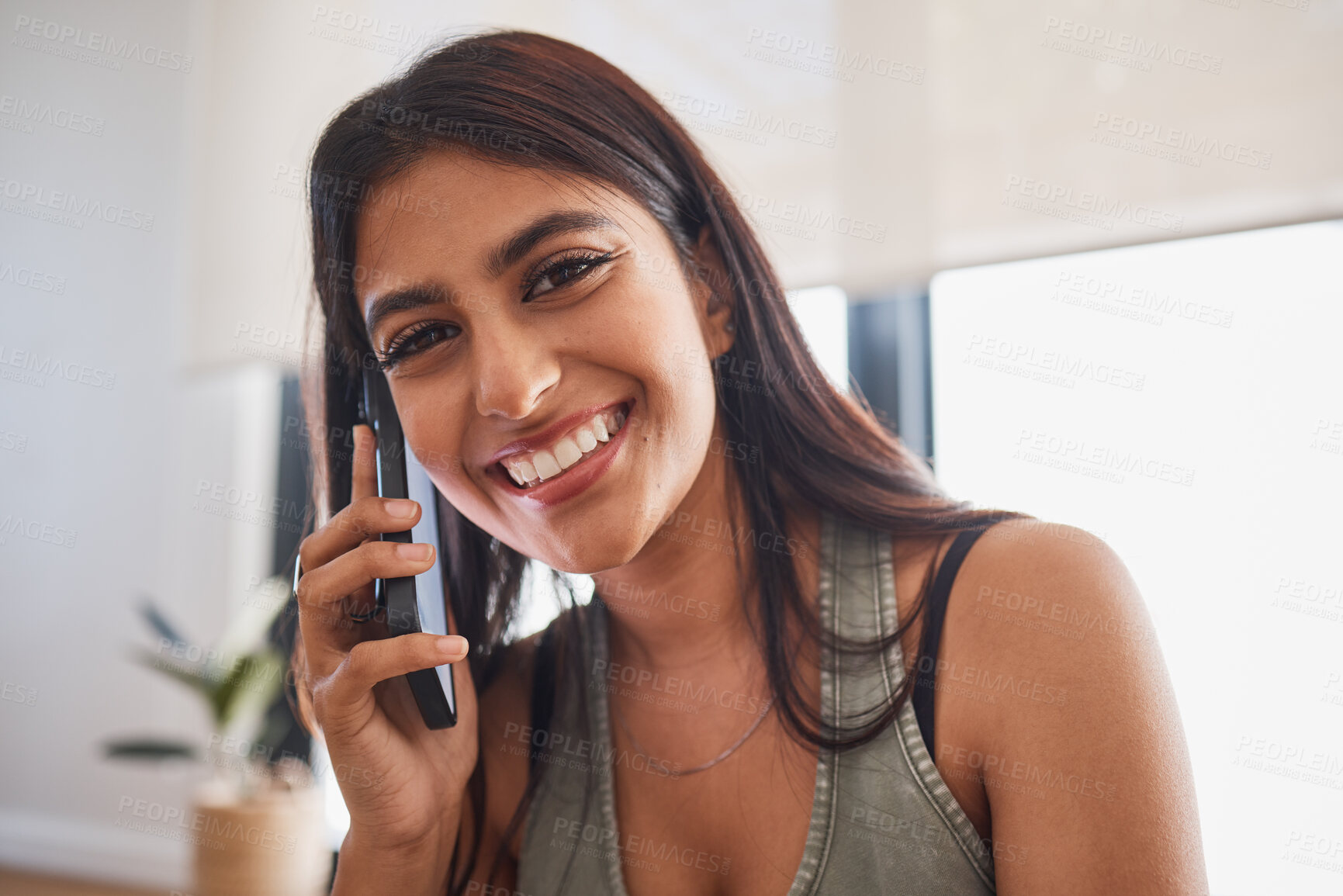 Buy stock photo Woman, smile and phone call in home portrait for communication, conversation or talking with happiness. Girl, smartphone and happy in living room, lounge or house for networking on phone in Mumbai