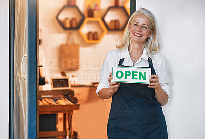 Buy stock photo Restaurant, cafe and woman with open sign, senior waiter at local coffee shop and small business ready for business. Hospitality, elderly Canada waitress and manager with happy smile greeting you