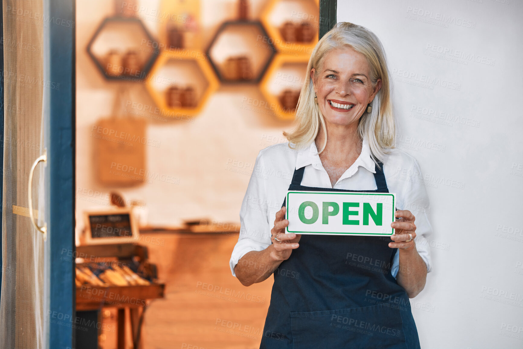 Buy stock photo Open sign, woman and small business for honey, retail and shop with smile in portrait and happy with natural product startup business. Elderly business owner, organic and raw, store with shopkeeper.