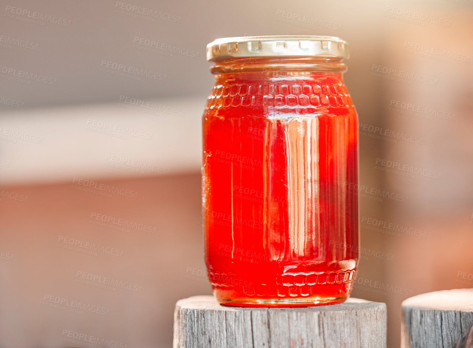 Buy stock photo Honey, jar and background of glass, healthy nutrition and sugar production from bee farming, organic and sustainability from nature. Closeup bottle, liquid and honeycomb container, package and syrup 