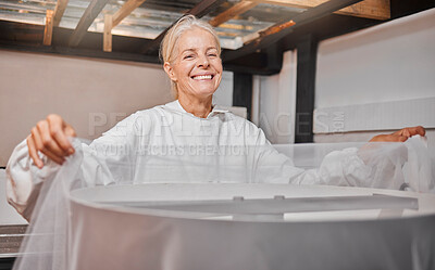 Buy stock photo Beekeeper, honey farming and agriculture with a woman farmer working in a warehouse or factory.  Farm, sustainability and industry with a female at work in agricultural production or manufacturing