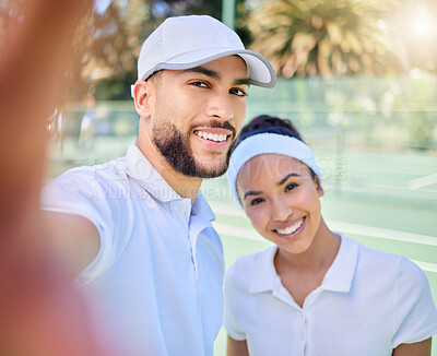 Buy stock photo Selfie, tennis and sports with a couple on a court to take a photograph after their training or game. Portrait, fitness and sport with a man and woman tennis player posing for a picture together