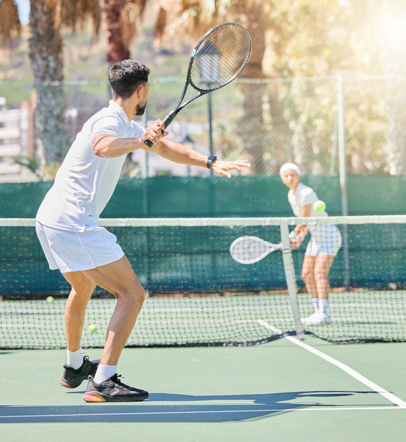 Buy stock photo Tennis, man and woman training for fitness as a couple outdoors in a game or practice match in summer. Wellness, focus and healthy person playing sports on a tennis court in a workout or exercise