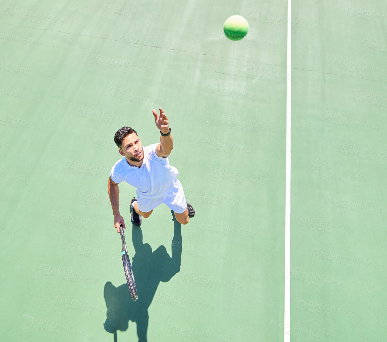 Buy stock photo Start, above and man playing tennis on court for fitness, workout and training for a competition. Exercise, sports and professional athlete serving during a game of sport with focus in a match