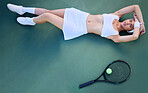 Sports, tennis and tired woman on ground after training, match or practice at a tennis court for health, wellness and cardio above. Tennis player, girl and relax on a floor, break and rest after game