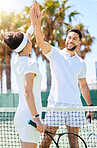 Tennis, friends and high five for sports game, exercise or workout together on the tennis court. Man and woman tennis player touch hands with smile in sport fitness for fun friendly match outdoors