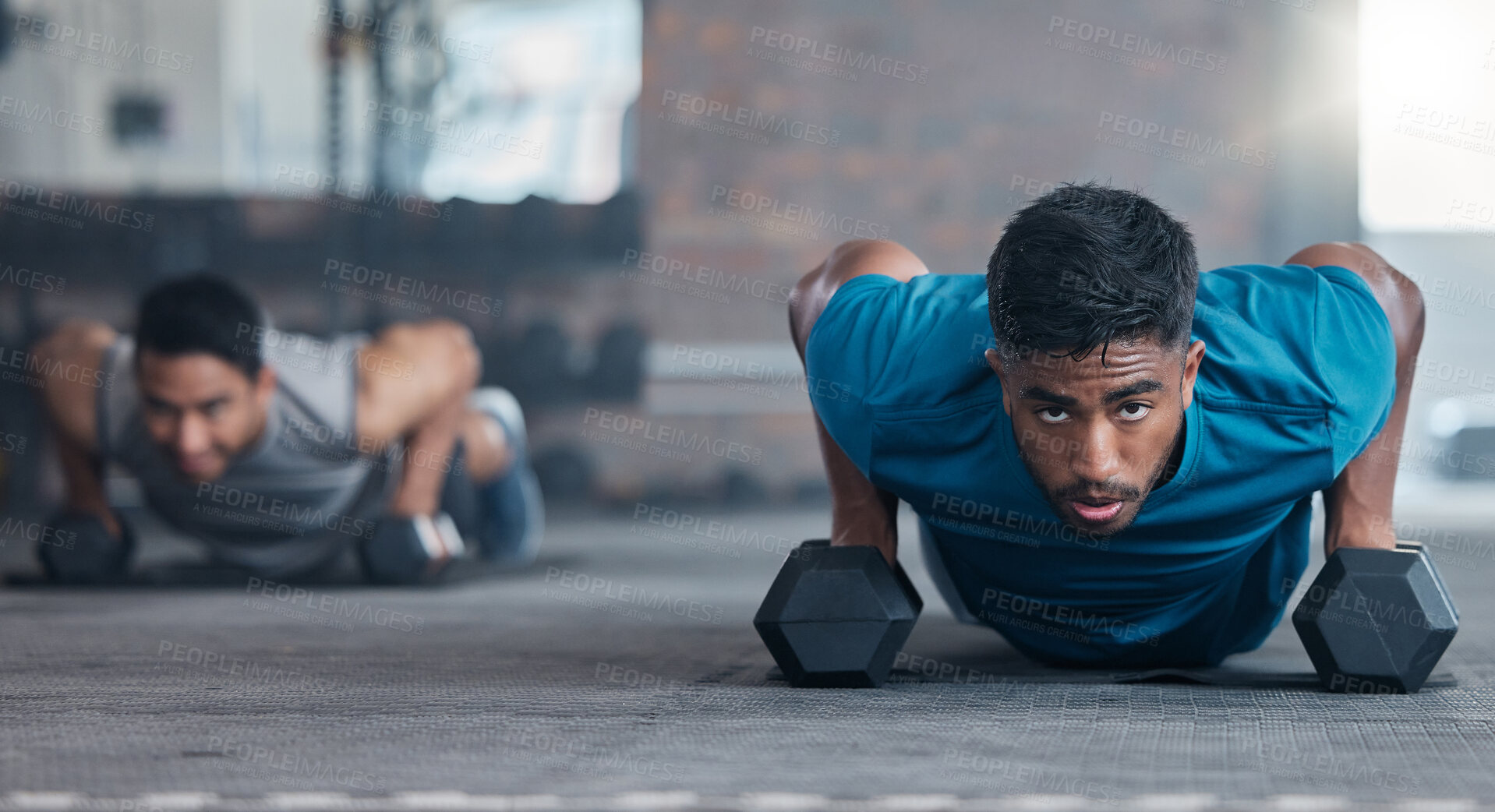 Buy stock photo Fitness, dumbbell weights and men doing a push up exercise for strength, health and wellness in a gym. Sports, motivation and athletes doing a workout or training routine together in a sport center.