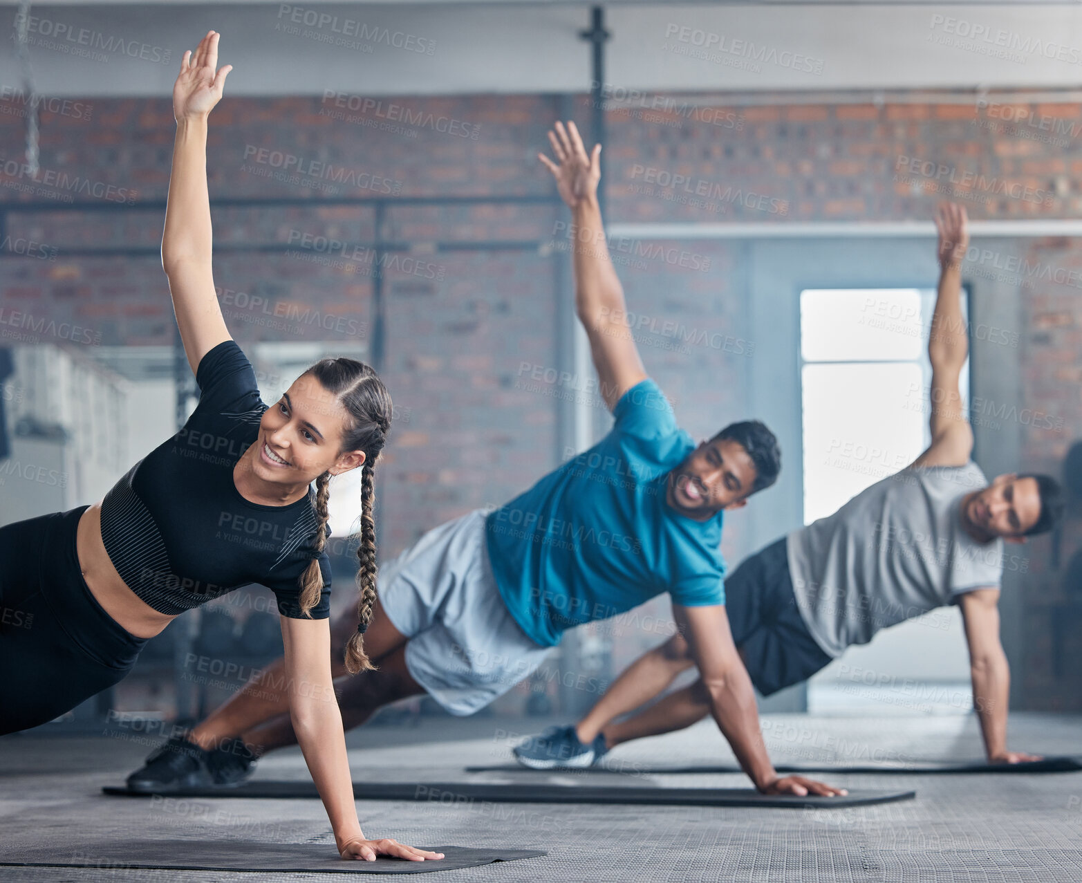 Buy stock photo Fitness, team and stretching arms for workout, exercise or training together with smile at the gym. Active people in a sports class for warm up stretch, arm and body balance in healthy wellness