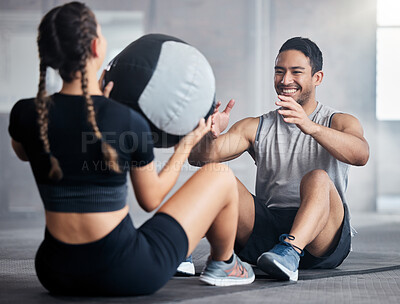 Buy stock photo Fitness, ball and couple doing an exercise together for health, wellness and strength in the gym. Sports, healthy and strong man and woman athletes doing a workout or training in a sport center.