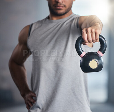 Fitness, exercise and man with kettlebell for weight training and workout for health and wellness at gym. Hand of strong athlete or bodybuilder with metal for healthy lifestyle and muscle motivation
