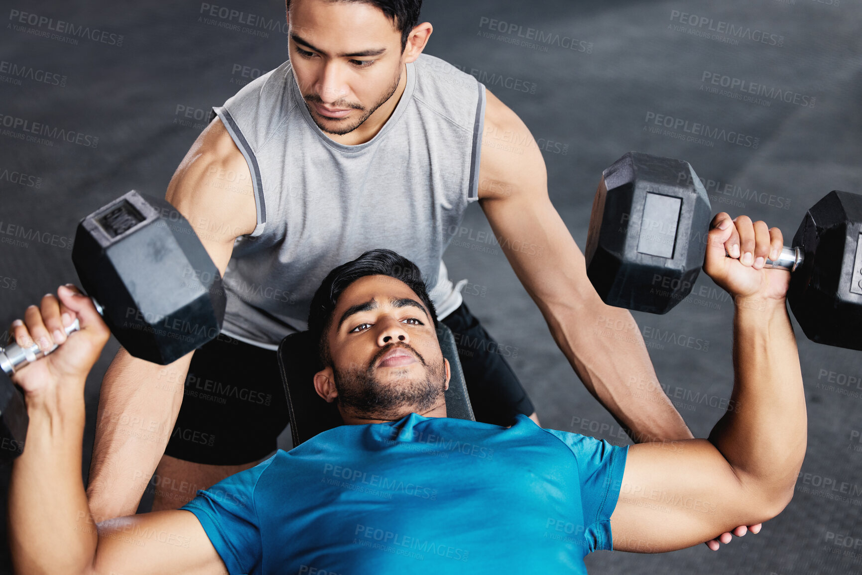 Buy stock photo Fitness, dumbbell training and personal trainer men with support, trust and muscle help in gym together. Helping, coaching and motivation of coach for man bodybuilder challenge, exercise or workout
