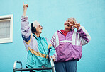Senior, music and disability with a woman friends outdoor in a city having fun together with a peace sign hand gesture. Freedom, retirement and happy with a mature female and friend bonding outside 