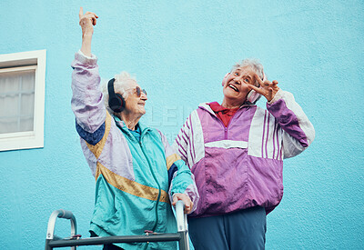 Buy stock photo Senior, music and disability with a woman friends outdoor in a city having fun together with a peace sign hand gesture. Freedom, retirement and happy with a mature female and friend bonding outside 